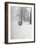 Snow Falling While People Take a Stroll Across Campus of Winchester College-Cornell Capa-Framed Photographic Print