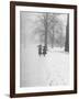 Snow Falling While People Take a Stroll Across Campus of Winchester College-Cornell Capa-Framed Photographic Print