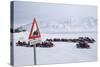 Snow Mobile Traffic Sign in Front of Snow Mobiles-Stephen Studd-Stretched Canvas