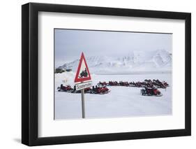 Snow Mobile Traffic Sign in Front of Snow Mobiles-Stephen Studd-Framed Photographic Print