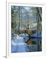 Snow on the Basingstoke Canal, Stacey's Bridge and Towpath, Winchfield, Hampshire, England, UK-Pearl Bucknall-Framed Photographic Print