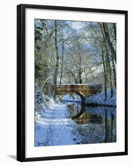 Snow on the Basingstoke Canal, Stacey's Bridge and Towpath, Winchfield, Hampshire, England, UK-Pearl Bucknall-Framed Photographic Print