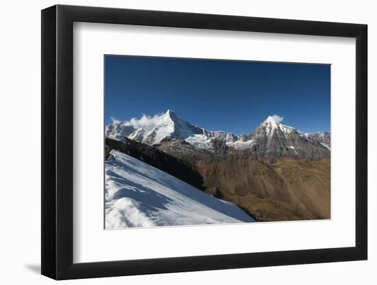 Snow on the Nyile La, a 4950m pass, and the peak of Jitchu Drake at 6714m in the distance, Bhutan,-Alex Treadway-Framed Photographic Print