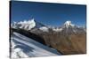 Snow on the Nyile La, a 4950m pass, and the peak of Jitchu Drake at 6714m in the distance, Bhutan,-Alex Treadway-Stretched Canvas