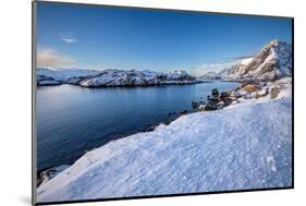 Snow over shore and mountains in winter, Lofoten Islands-Christophe Courteau-Mounted Photographic Print