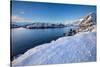 Snow over shore and mountains in winter, Lofoten Islands-Christophe Courteau-Stretched Canvas