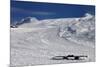 Snowboard in Snow on Ski Slope at Sun Windy Evening-BSANI-Mounted Photographic Print