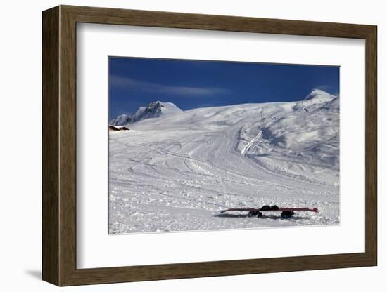 Snowboard in Snow on Ski Slope at Sun Windy Evening-BSANI-Framed Photographic Print