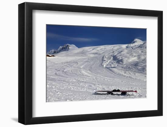 Snowboard in Snow on Ski Slope at Sun Windy Evening-BSANI-Framed Photographic Print