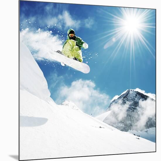 Snowboarder At Jump Inhigh Mountains At Sunny Day-dellm60-Mounted Photographic Print