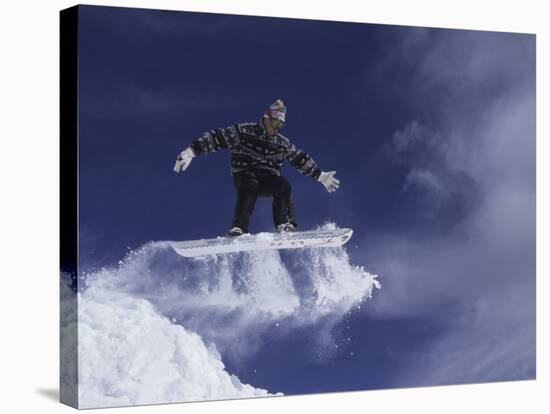 Snowboarder Flying Through the Air, USA-null-Stretched Canvas