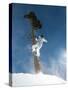 Snowboarder Mid-Air During Jump-null-Stretched Canvas