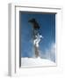 Snowboarder Mid-Air During Jump-null-Framed Photographic Print