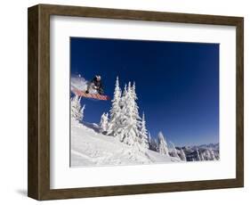 Snowboarding Action at Whitefish Mountain Resort in Whitefish, Montana, USA-Chuck Haney-Framed Photographic Print