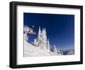 Snowboarding Action at Whitefish Mountain Resort in Whitefish, Montana, USA-Chuck Haney-Framed Photographic Print