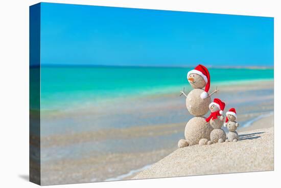 Snowmans Family at Sea Beach in Santa Hat. New Years and Christmas-EMprize-Stretched Canvas