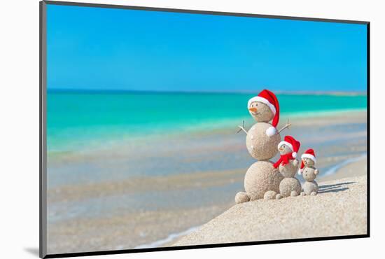 Snowmans Family at Sea Beach in Santa Hat. New Years and Christmas-EMprize-Mounted Photographic Print