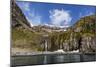 Snowmelt Waterfall in Hercules Bay, South Georgia, Polar Regions-Michael Nolan-Mounted Photographic Print