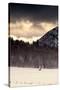 Snowmobiler Riding At Sunset In The Mountains-Lindsay Daniels-Stretched Canvas