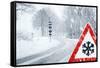 Snowy Curvy Road with Traffic Sign-trendobjects-Framed Stretched Canvas