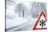 Snowy Curvy Road with Traffic Sign-trendobjects-Stretched Canvas