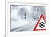 Snowy Curvy Road with Traffic Sign-trendobjects-Framed Photographic Print