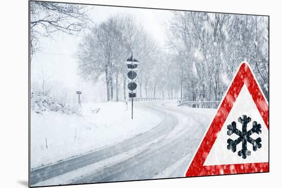 Snowy Curvy Road with Traffic Sign-trendobjects-Mounted Photographic Print