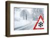 Snowy Curvy Road with Traffic Sign-trendobjects-Framed Photographic Print