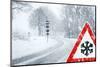 Snowy Curvy Road with Traffic Sign-trendobjects-Mounted Photographic Print