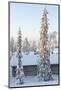 Snowy Log Cabin between Trees-Risto0-Mounted Photographic Print