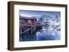 Snowy Mountains and the Typical Red Houses Reflected in the Cold Sea at Dusk-Roberto Moiola-Framed Photographic Print