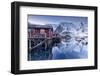 Snowy Mountains and the Typical Red Houses Reflected in the Cold Sea at Dusk-Roberto Moiola-Framed Photographic Print