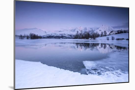 Snowy Peaks are Reflected in the Frozen Lake Jaegervatnet at Dusk, Lapland-Roberto Moiola-Mounted Photographic Print