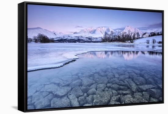 Snowy peaks are reflected in the frozen Lake Jaegervatnet at sunset Stortind Lyngen Alps Tromsa? La-ClickAlps-Framed Stretched Canvas