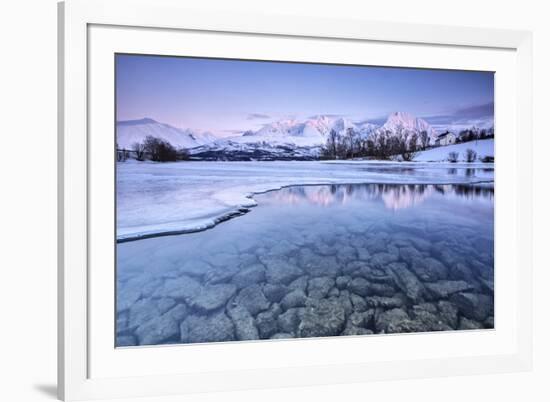 Snowy peaks are reflected in the frozen Lake Jaegervatnet at sunset Stortind Lyngen Alps Tromsa? La-ClickAlps-Framed Photographic Print