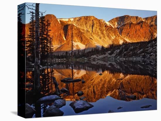 Snowy Range Reflected in Mirror Lake-Steve Terrill-Stretched Canvas