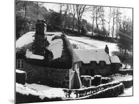 Snowy Thatched Cottages-null-Mounted Photographic Print