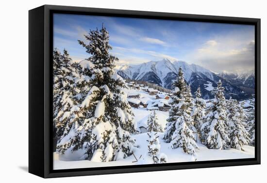 Snowy Woods and Mountain Huts Framed by the Winter Sunset, Bettmeralp, District of Raron-Roberto Moiola-Framed Stretched Canvas