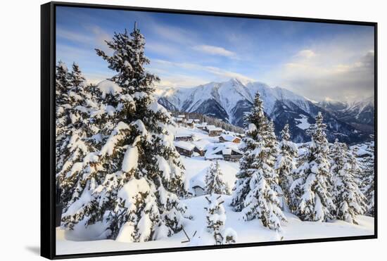 Snowy Woods and Mountain Huts Framed by the Winter Sunset, Bettmeralp, District of Raron-Roberto Moiola-Framed Stretched Canvas