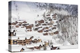 Snowy Woods Frame the Typical Alpine Village and Ski Resort, Bettmeralp, District of Raron-Roberto Moiola-Stretched Canvas