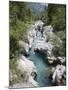 Soca River with Clear Emerald Water Flowing Between Eroded Rocks in Trenta Valley in Summer-Pearl Bucknall-Mounted Photographic Print