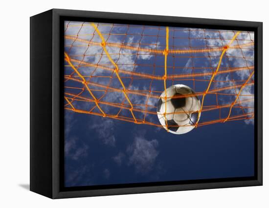 Soccer Ball Going Into Goal Net-Randy Faris-Framed Stretched Canvas