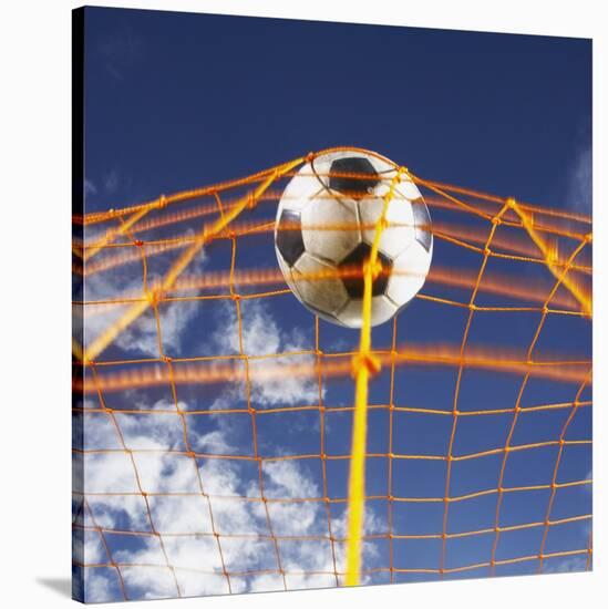 Soccer Ball Going Into Goal Net-Randy Faris-Stretched Canvas