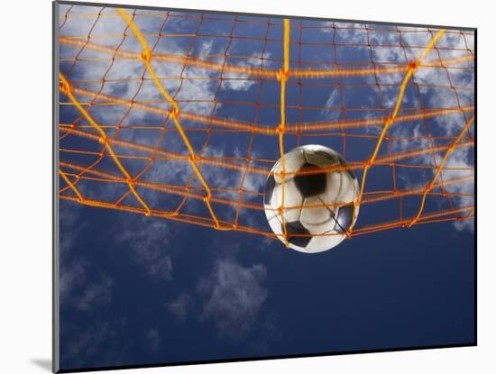 Soccer Ball Going Into Goal Net-Randy Faris-Mounted Photographic Print