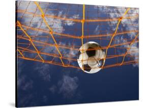 Soccer Ball Going Into Goal Net-Randy Faris-Stretched Canvas