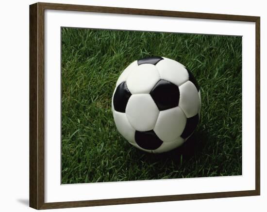 Soccer Ball in Grass-null-Framed Photographic Print