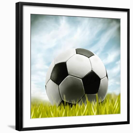 Soccer Ball Resting on Grass-null-Framed Photographic Print