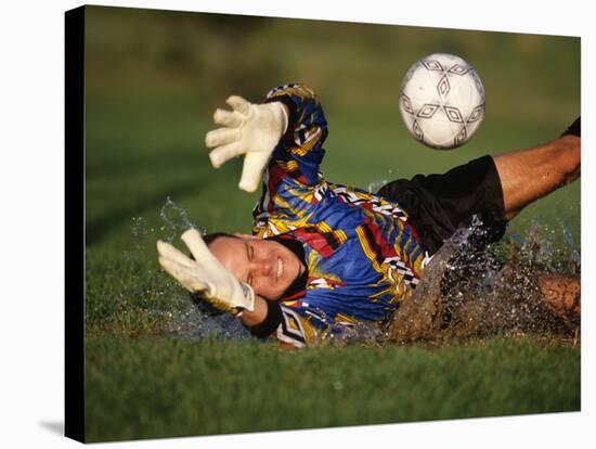 Soccer Goalie in Action-null-Stretched Canvas