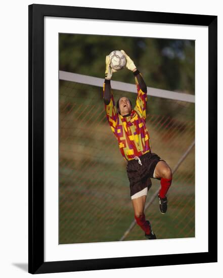 Soccer Goalie in Action-null-Framed Photographic Print