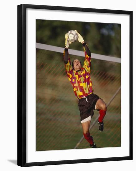 Soccer Goalie in Action-null-Framed Photographic Print